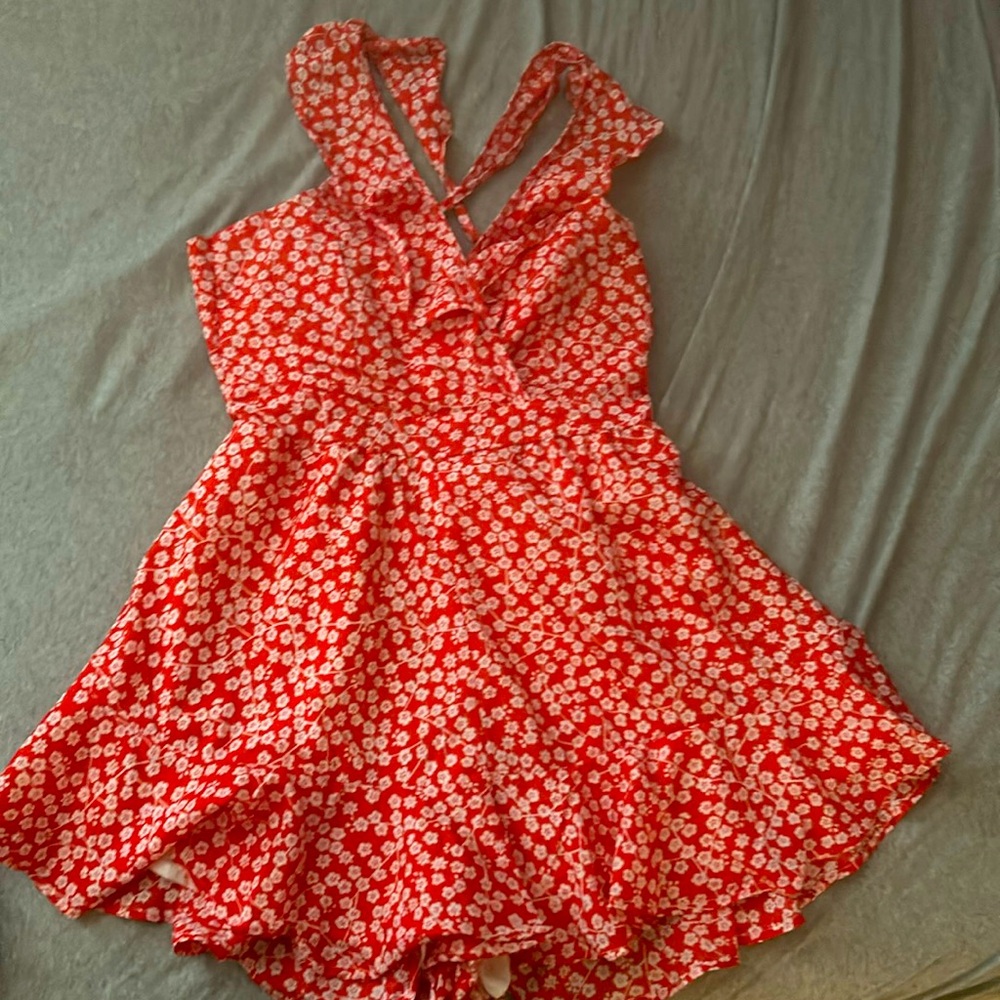 Orange floral romper. Size M Womens.